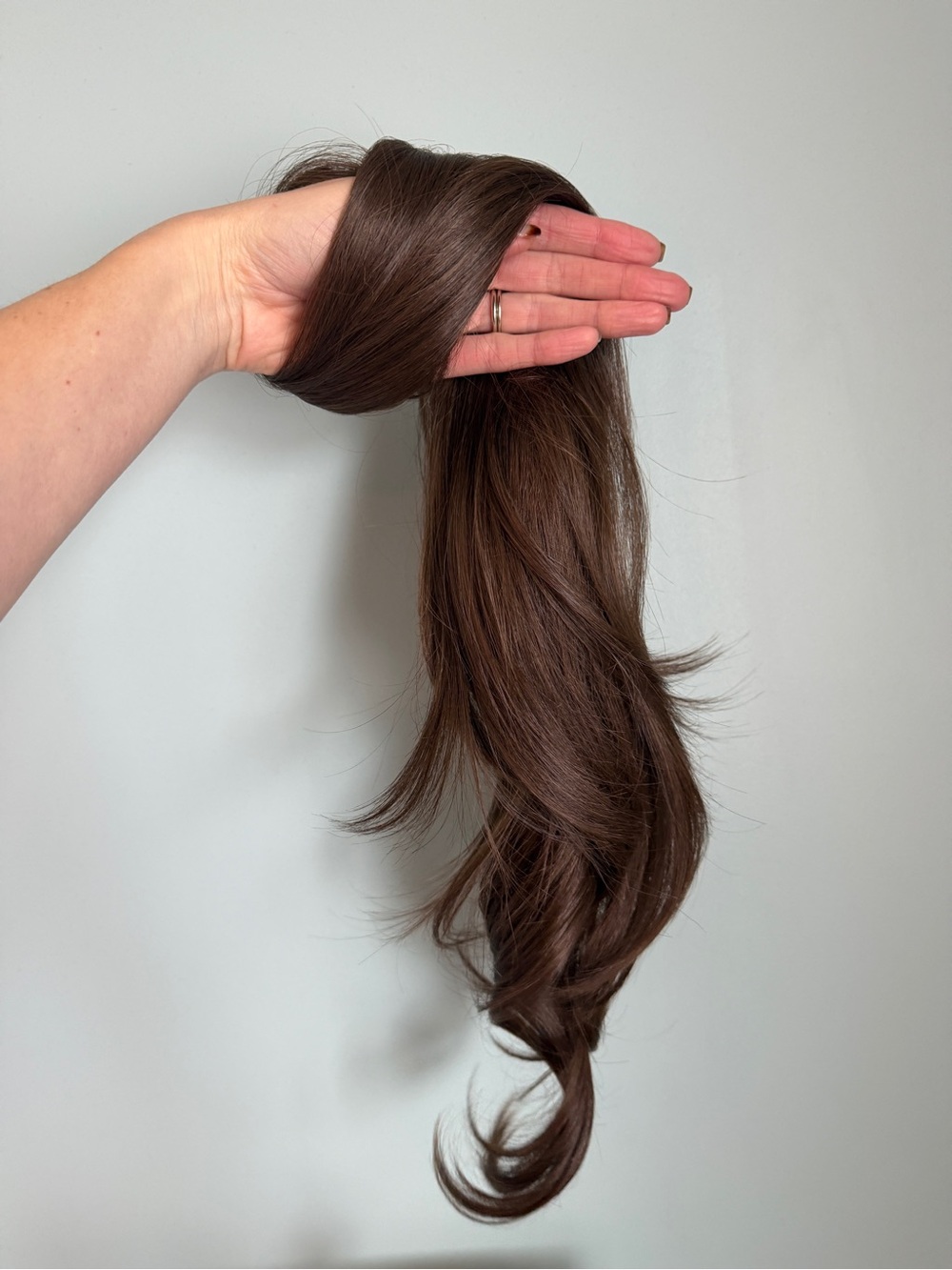 Brown hair twist extensions.